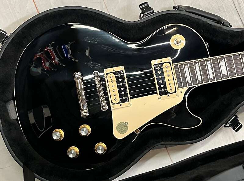 Гриф Gibson Les Paul Classic 2022 - Ebony New Unplayed w/ Case Auth Dealer 9lbs 3oz #434
Гриф Gibson Les Paul Classic 2022 - Ebony New Unplayed w/ Case Auth Dealer 9lbs 3oz #434