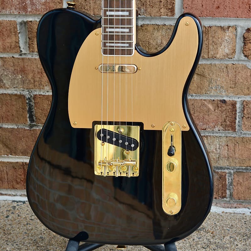Fender 40th Anniversary Telecaster, Gold Edition, накладка на гриф Laurel, накладка из анодированного золота, черный 40th Anniversary Telecaster, Gold Edition, Laurel Fingerboar...
Fender 40th Anniversary Telecaster, Gold Edition, накладка на гриф Laurel, накладка из анодированного золота, черный 40th Anniversary Telecaster, Gold Edition, Laurel Fingerboar...