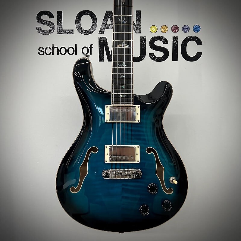 PRS SE Hollowbody II Piezo Peacock Blue Smokeburst James Burton Telecaster - Blue Paisley Flames
PRS SE Hollowbody II Piezo Peacock Blue Smokeburst James Burton Telecaster - Blue Paisley Flames