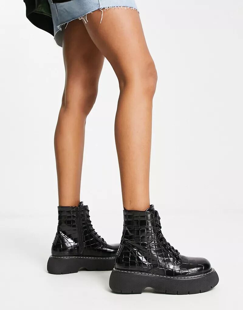 Черные ботинки Steve Madden Wanny со шнуровкой спереди, толстой подошвой и имитацией кожи крокодила
Черные ботинки Steve Madden Wanny со шнуровкой спереди, толстой подошвой и имитацией кожи крокодила