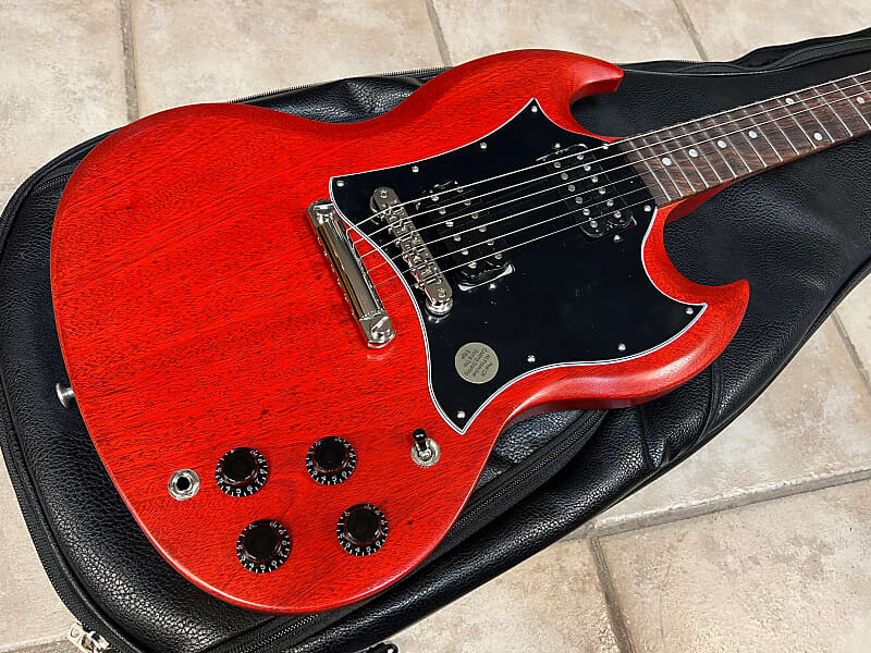 2022 Электрогитара Gibson SG Tribute Vintage Satin Cherry SG Tribute Electric Guitar Vintage Satin Cherry
2022 Электрогитара Gibson SG Tribute Vintage Satin Cherry SG Tribute Electric Guitar Vintage Satin Cherry