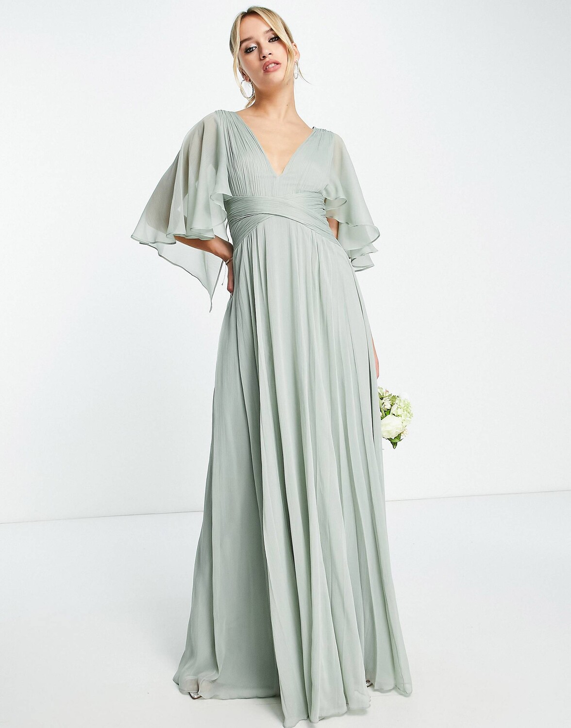 Оливковое платье макси со сборками на лифе и драпировкой ASOS DESIGN Bridesmaid, с запахом на талии и развевающимися рукавами-накидками ASOS DESIGN Bridesmaid, Зеленый
Оливковое платье макси со сборками на лифе и драпировкой ASOS DESIGN Bridesmaid, с запахом на талии и развевающимися рукавами-накидками ASOS DESIGN Bridesmaid, Зеленый