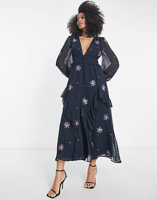 Чайное платье миди с присборенной талией и пуговицами ASOS DESIGN с вышивкой по всей поверхности темно-серого и фиолетового цвета
Чайное платье миди с присборенной талией и пуговицами ASOS DESIGN с вышивкой по всей поверхности темно-серого и фиолетового цвета