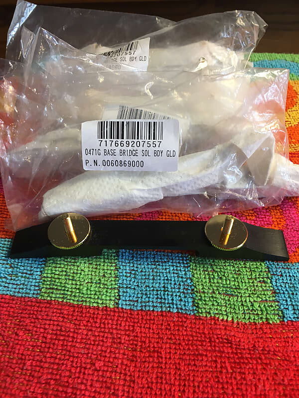 Базовый мост Gretsch из цельного дерева и золота, номер по каталогу 0060869000 Base Bridge solid body PN 0060869000
Базовый мост Gretsch из цельного дерева и золота, номер по каталогу 0060869000 Base Bridge solid body PN 0060869000
