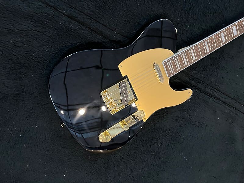 Squier 40th Anniversary Gold Edition Black #ISSK21001970 (6 фунтов 11,6 унций) 40th Anniversary Gold Edition Telecaster
Squier 40th Anniversary Gold Edition Black #ISSK21001970 (6 фунтов 11,6 унций) 40th Anniversary Gold Edition Telecaster