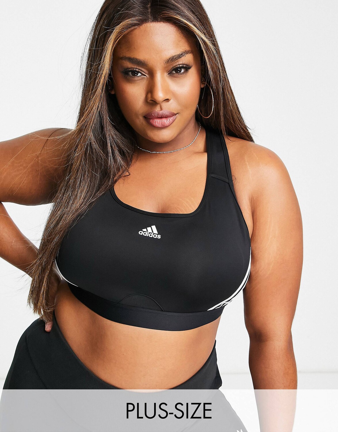 Черный спортивный бюстгальтер со средней поддержкой adidas Training plus с 3 полосками
Черный спортивный бюстгальтер со средней поддержкой adidas Training plus с 3 полосками