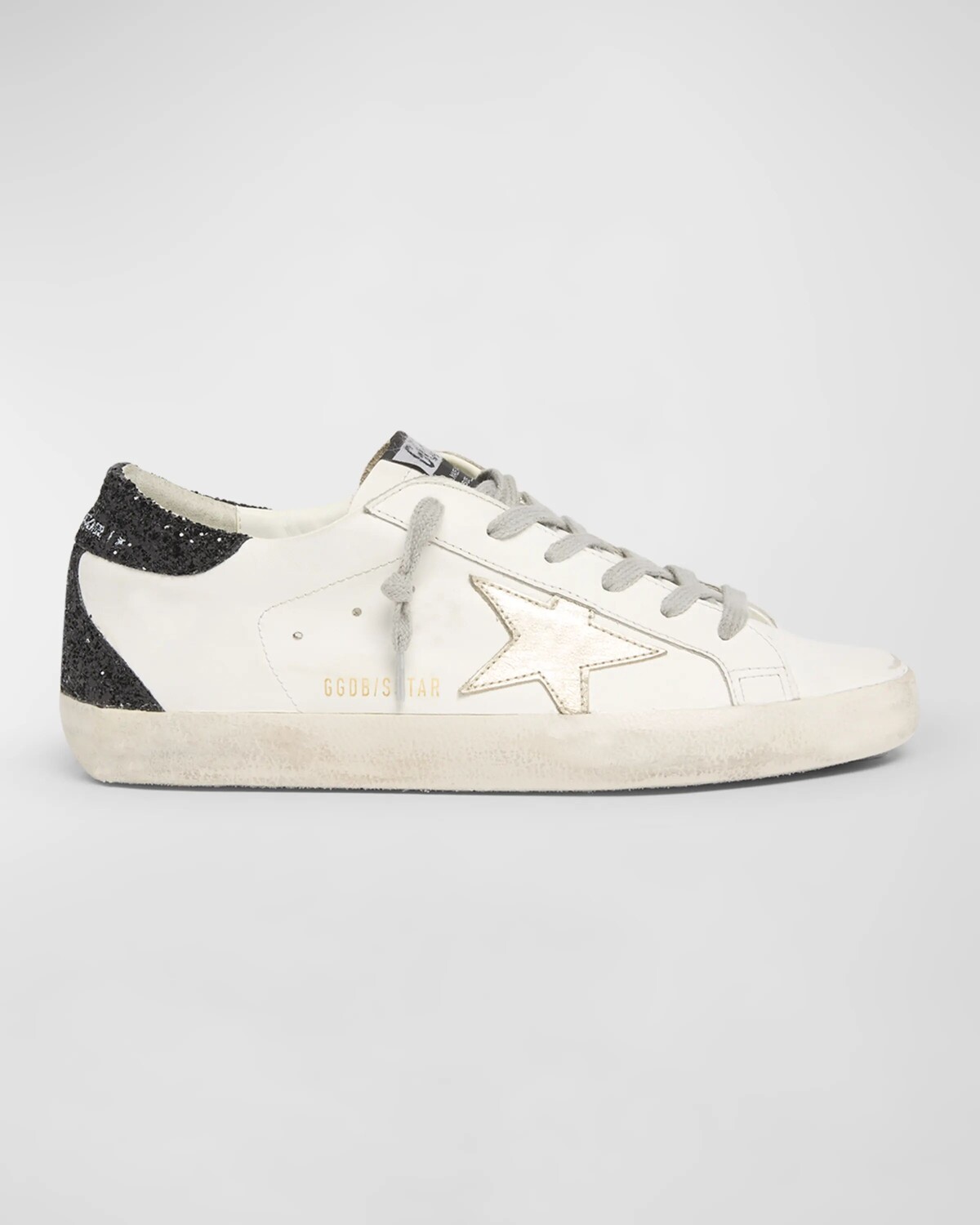 Кожаные низкие кеды Superstar с блестками Golden Goose, цвет Whiteplatinumblack
Кожаные низкие кеды Superstar с блестками Golden Goose, цвет Whiteplatinumblack