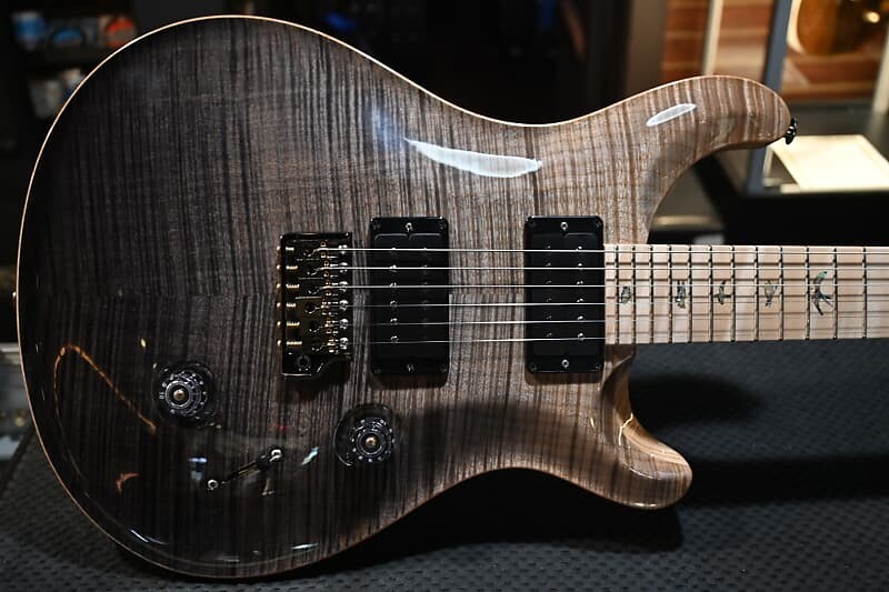 PRS Wood Library Custom 24 10-Top Болотный ясень Фигурный кленовый гриф Серый Черный Fade #2736
PRS Wood Library Custom 24 10-Top Болотный ясень Фигурный кленовый гриф Серый Черный Fade #2736