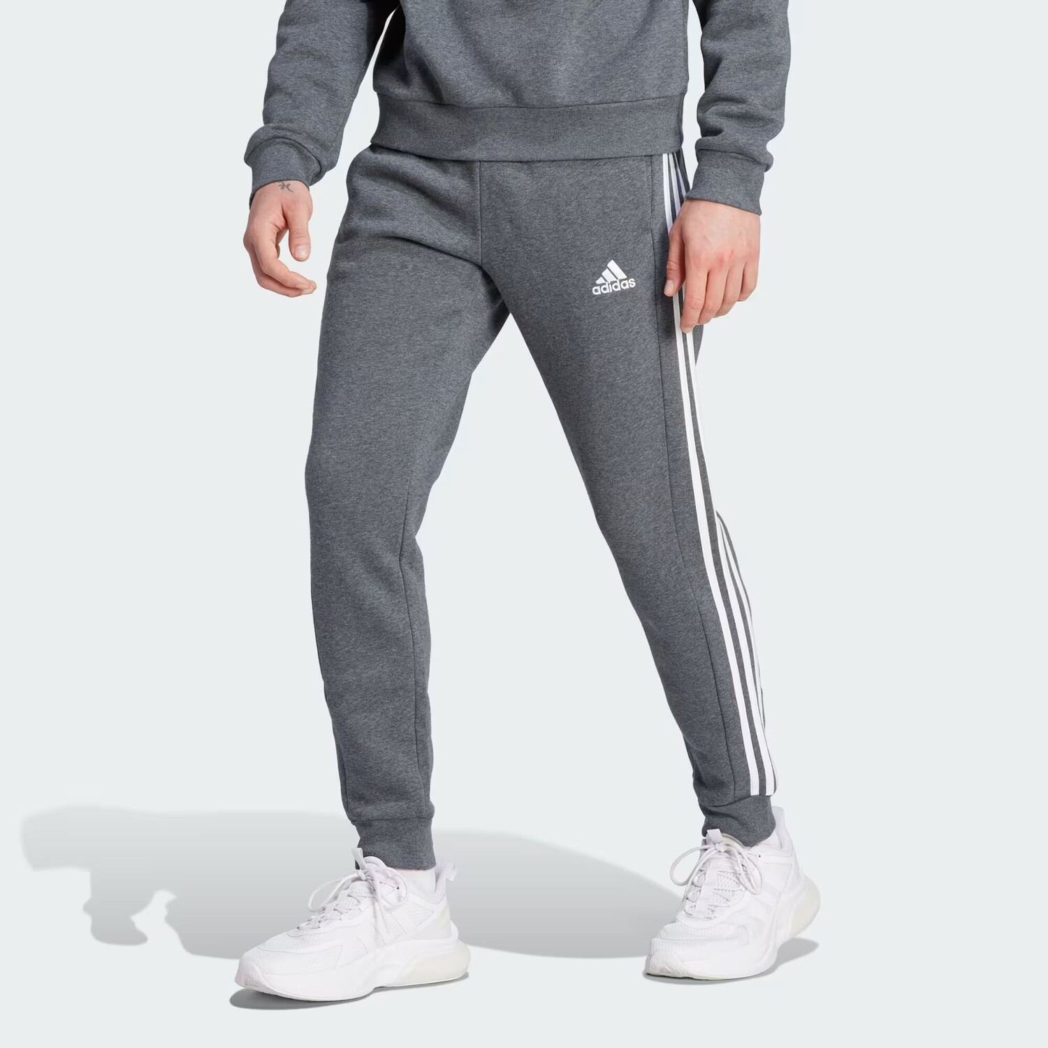 Флисовые брюки Essentials с 3 полосками и зауженными манжетами Adidas, цвет Dark Grey Heather
Флисовые брюки Essentials с 3 полосками и зауженными манжетами Adidas, цвет Dark Grey Heather