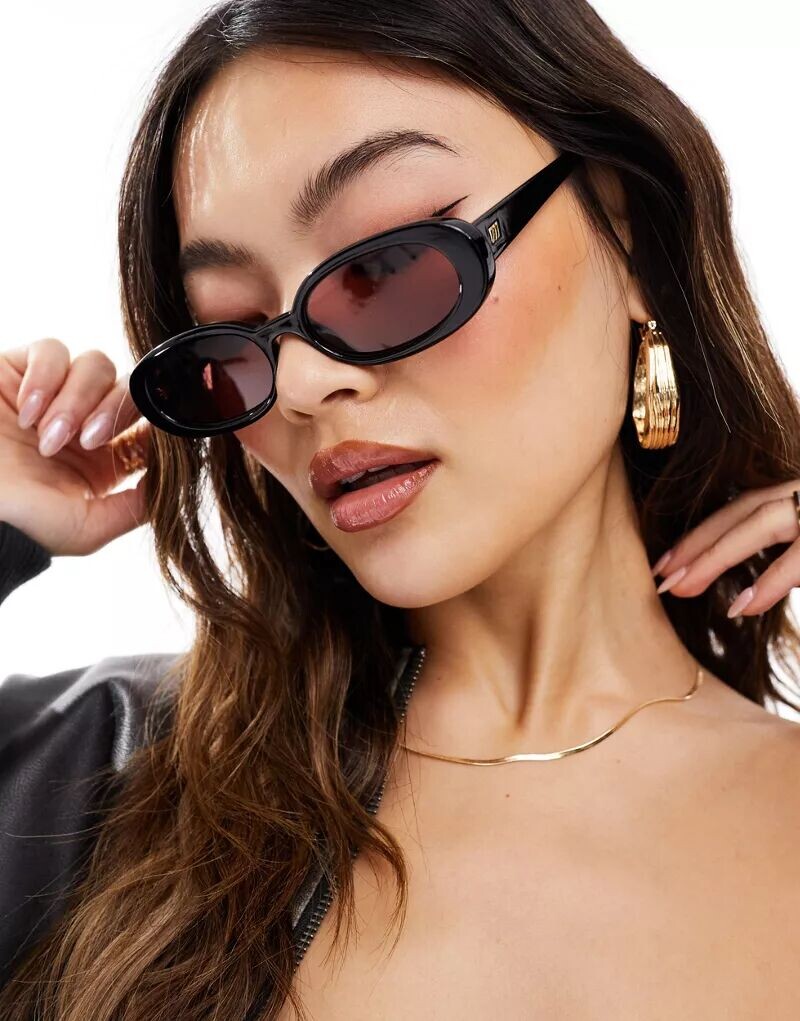 Черные овальные солнцезащитные очки Le Specs X ASOS Outta Love с розовыми линзами
Черные овальные солнцезащитные очки Le Specs X ASOS Outta Love с розовыми линзами