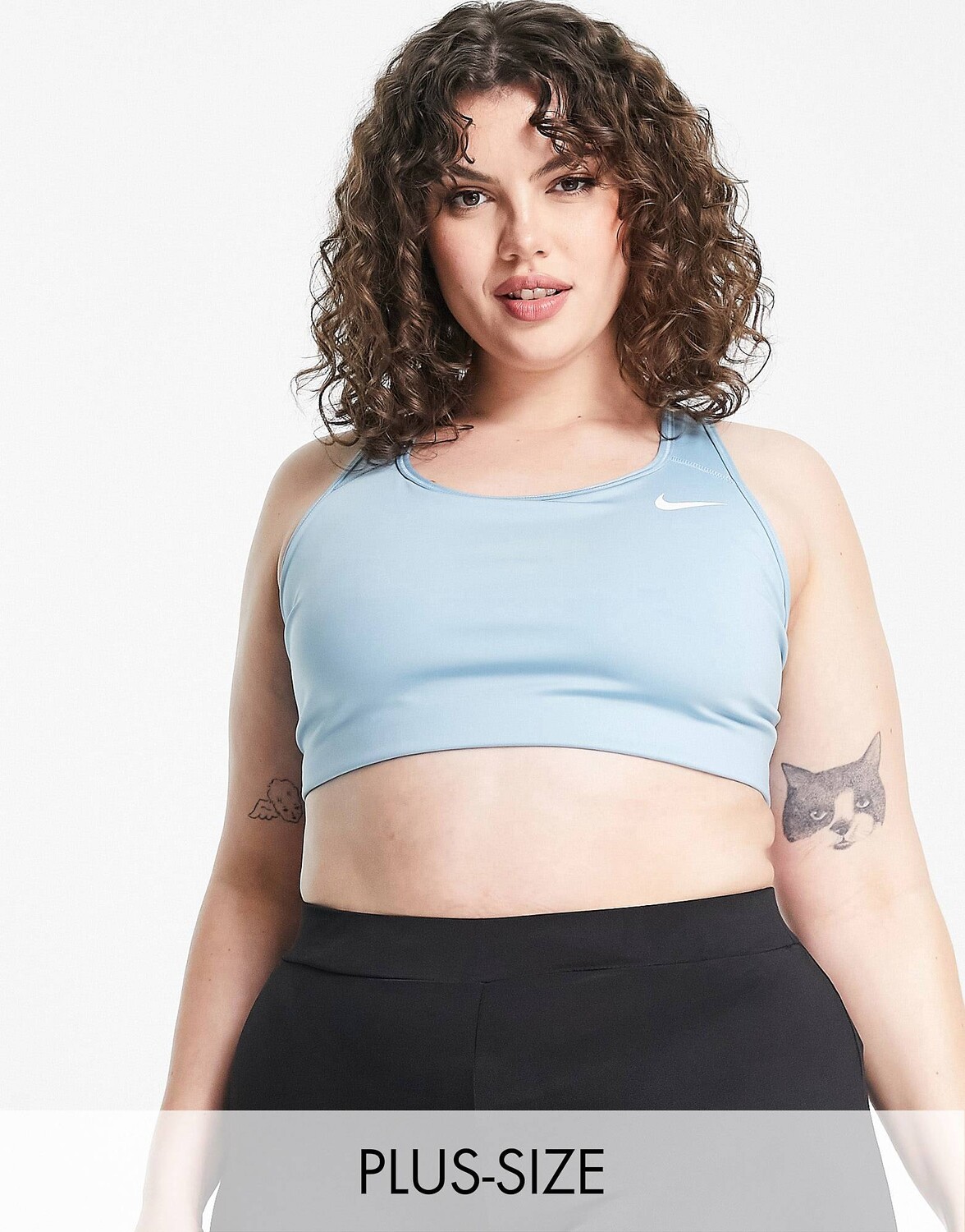 Синий спортивный бюстгальтер со средней поддержкой Nike Training Plus Dri-FIT Swoosh
Синий спортивный бюстгальтер со средней поддержкой Nike Training Plus Dri-FIT Swoosh