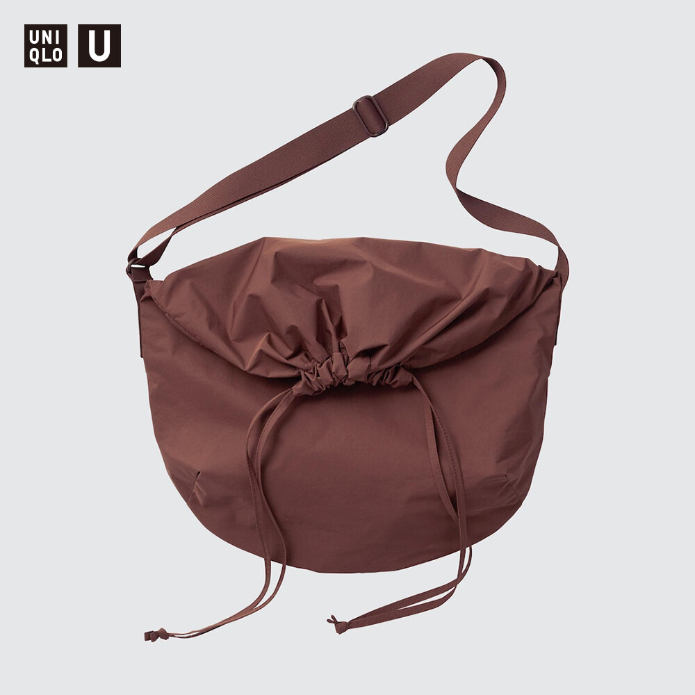 Модель сотрудничества Uniqlo Uniqlo U, мужская и женская сумка через плечо, сумка через плечо, сумка на шнурке, сумка для отдыха и путешествий
Модель сотрудничества Uniqlo Uniqlo U, мужская и женская сумка через плечо, сумка через плечо, сумка на шнурке, сумка для отдыха и путешествий
