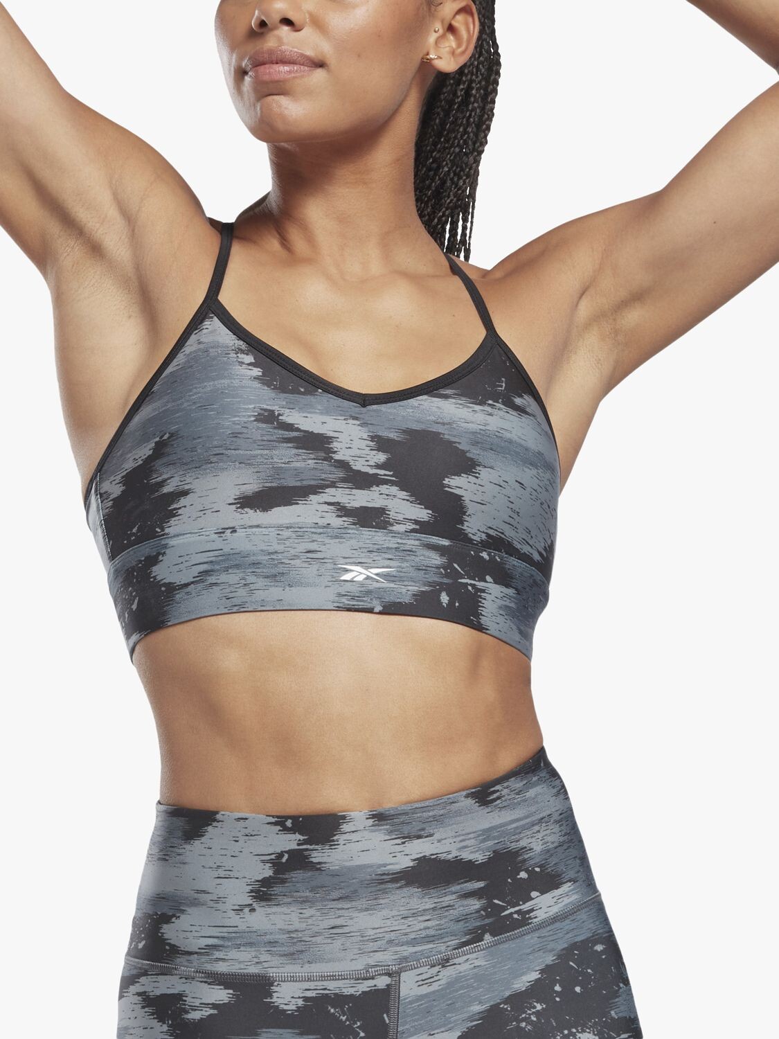 Спортивный бюстгальтер Reebok Workout Ready с камуфляжным принтом и низкой ударопрочностью
Спортивный бюстгальтер Reebok Workout Ready с камуфляжным принтом и низкой ударопрочностью