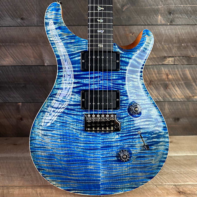 Электрогитара PRS Custom 24 Wood Library Flame Maple 10-Top Torrefied Maple Neck African Blackwood FB - Faded Blue Jean 365161
Электрогитара PRS Custom 24 Wood Library Flame Maple 10-Top Torrefied Maple Neck African Blackwood FB - Faded Blue Jean 365161