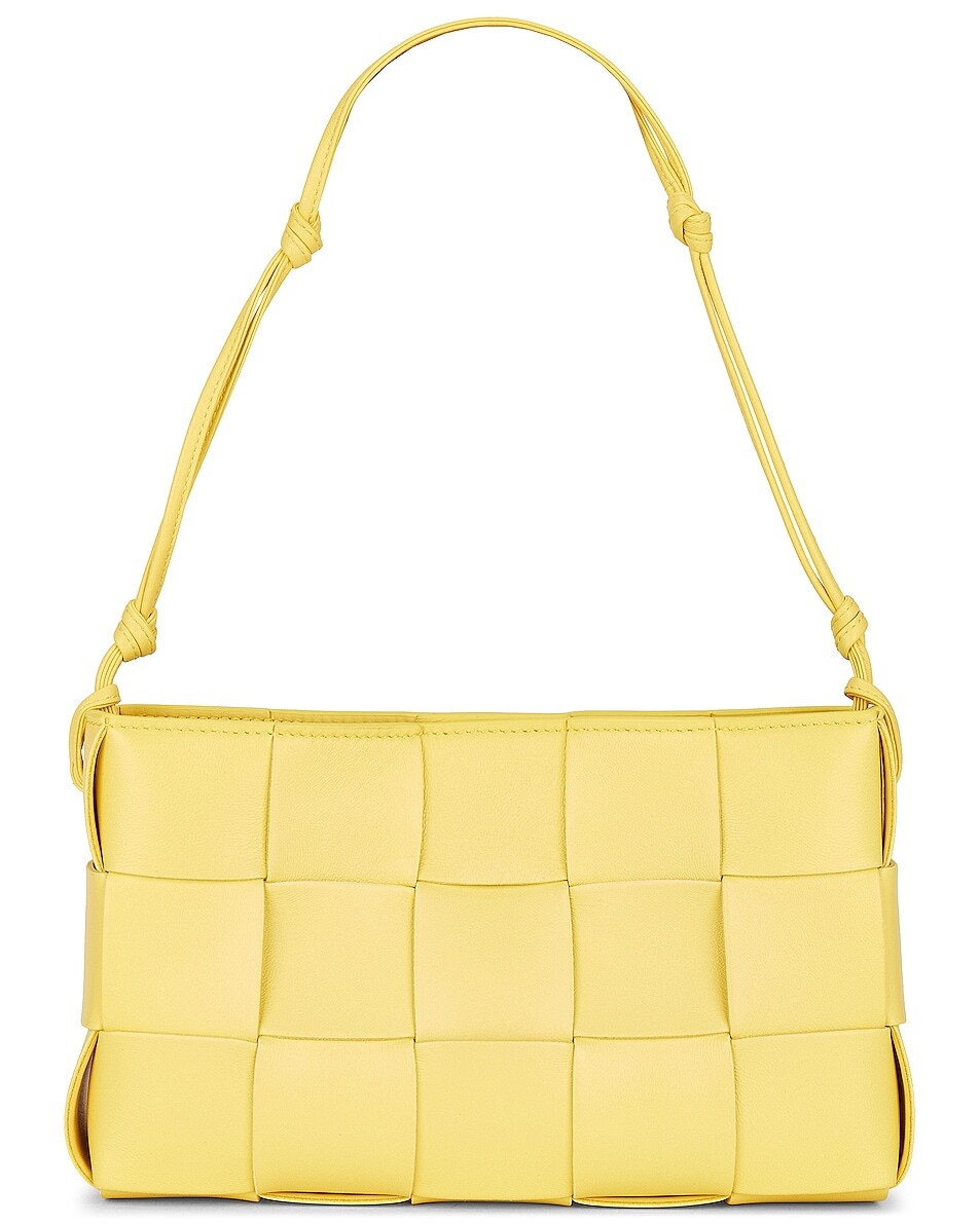 Сумка через плечо Bottega Veneta Baguette Pochette, цвет Sherbert & Silver
Сумка через плечо Bottega Veneta Baguette Pochette, цвет Sherbert & Silver