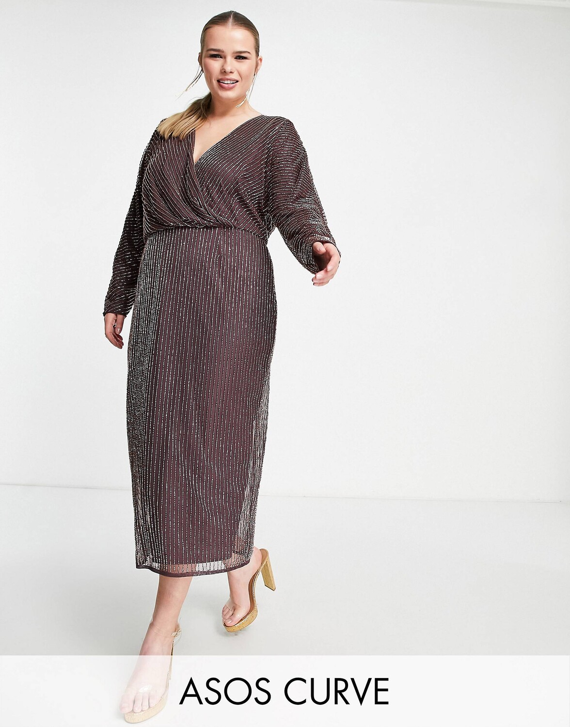 Лиловое платье миди с золотым декором в виде крыла летучей мыши ASOS DESIGN Curve
Лиловое платье миди с золотым декором в виде крыла летучей мыши ASOS DESIGN Curve