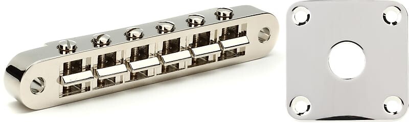 Аксессуары Gibson Nashville Tune-O-Matic Bridge с полной сборкой - никелевый комплект с аксессуарами Gibson Металлическая пластина домкрата для Les Paul - никель Gibson Accessories PBBR-045=1 PRJP-040=1
Аксессуары Gibson Nashville Tune-O-Matic Bridge с полной сборкой - никелевый комплект с аксессуарами Gibson Металлическая пластина домкрата для Les Paul - никель Gibson Accessories PBBR-045=1 PRJP-040=1