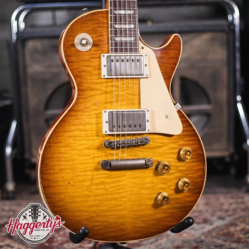 Электрогитара Gibson 1959 Les Paul Standard Reissue Heavy Aged - Golden Poppy Burst with Aged Brown/Pink Lifton Reissue 5-Latch Hardshell Case
Электрогитара Gibson 1959 Les Paul Standard Reissue Heavy Aged - Golden Poppy Burst with Aged Brown/Pink Lifton Reissue 5-Latch Hardshell Case