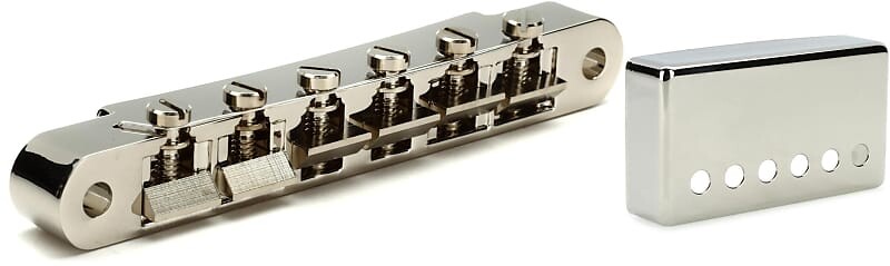 Аксессуары Gibson Бридж ABR-1 Tune-O-Matic в полной сборке - никель Комплект с аксессуарами Gibson Положение грифа Крышка хамбакера - никель Gibson Accessories PBBR-015=1 PRPC-030=1
Аксессуары Gibson Бридж ABR-1 Tune-O-Matic в полной сборке - никель Комплект с аксессуарами Gibson Положение грифа Крышка хамбакера - никель Gibson Accessories PBBR-015=1 PRPC-030=1