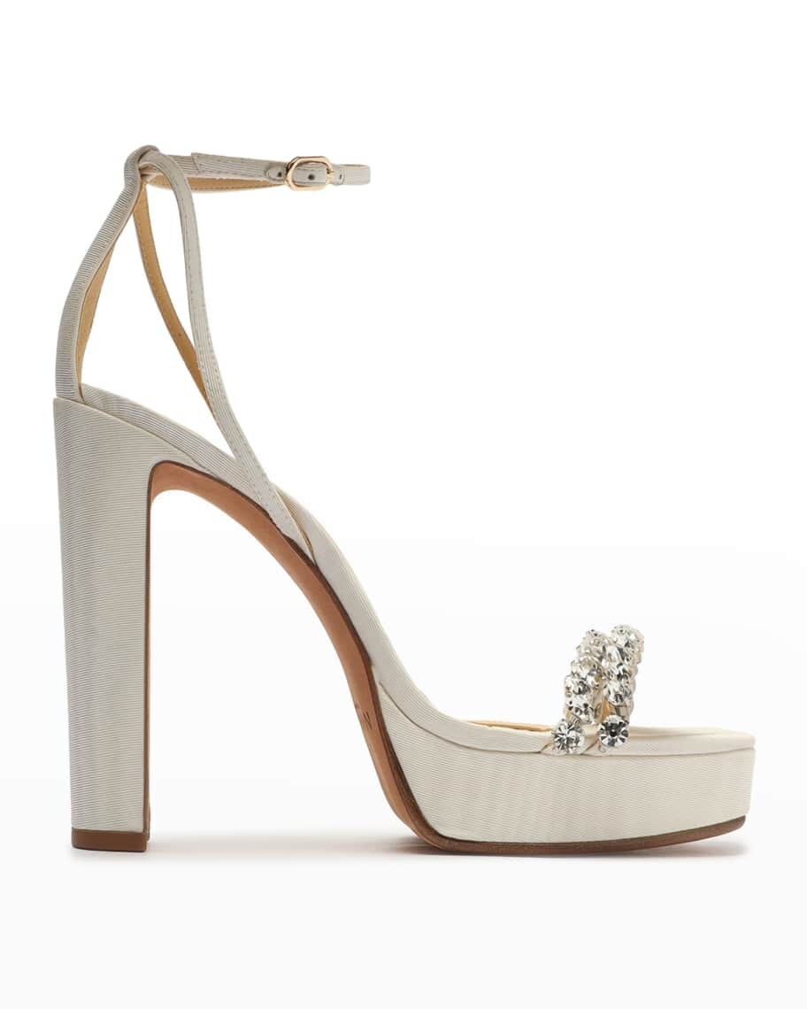 Босоножки Agnes на платформе с ремешком на щиколотке и украшением Alexandre Birman
Босоножки Agnes на платформе с ремешком на щиколотке и украшением Alexandre Birman