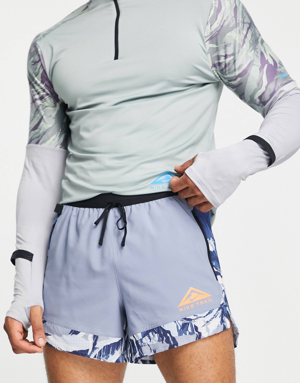 Синие 5-дюймовые шорты с графическим принтом Nike Trail Running Flex Stride 5 дюймов
Синие 5-дюймовые шорты с графическим принтом Nike Trail Running Flex Stride 5 дюймов