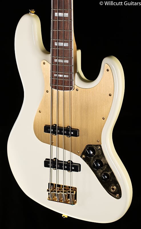 Squier 40th Anniversary Jazz Bass Gold Edition Laurel Fingerboard Gold Anodized Pickguard Olympic White Bass Guitar - ISSL21006650-8.90 lbs
Squier 40th Anniversary Jazz Bass Gold Edition Laurel Fingerboard Gold Anodized Pickguard Olympic White Bass Guitar - ISSL21006650-8.90 lbs