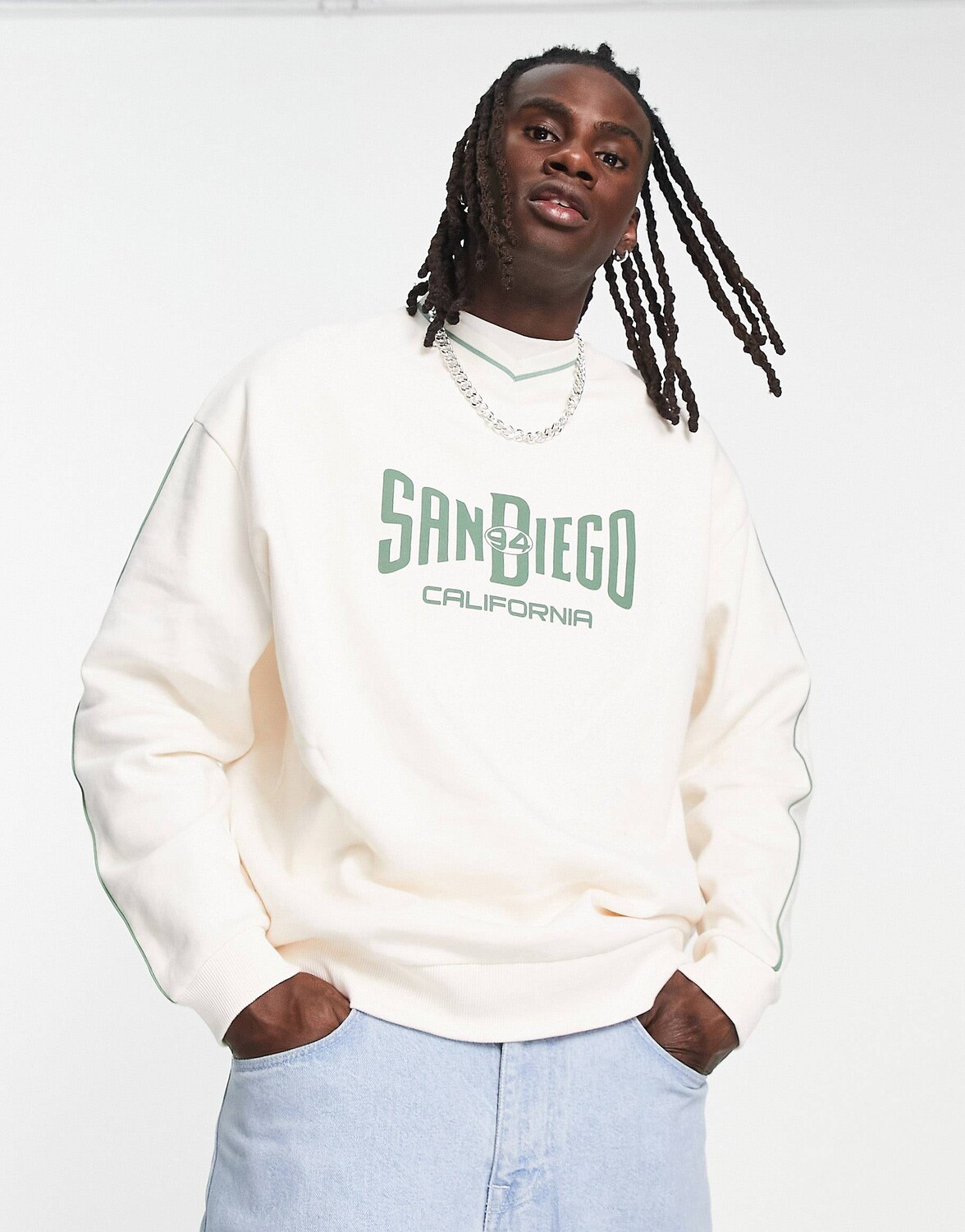 Белая толстовка оверсайз с v-образным вырезом ASOS DESIGN с принтом Сан-Диего и окантовкой ASOS DESIGN
Белая толстовка оверсайз с v-образным вырезом ASOS DESIGN с принтом Сан-Диего и окантовкой ASOS DESIGN