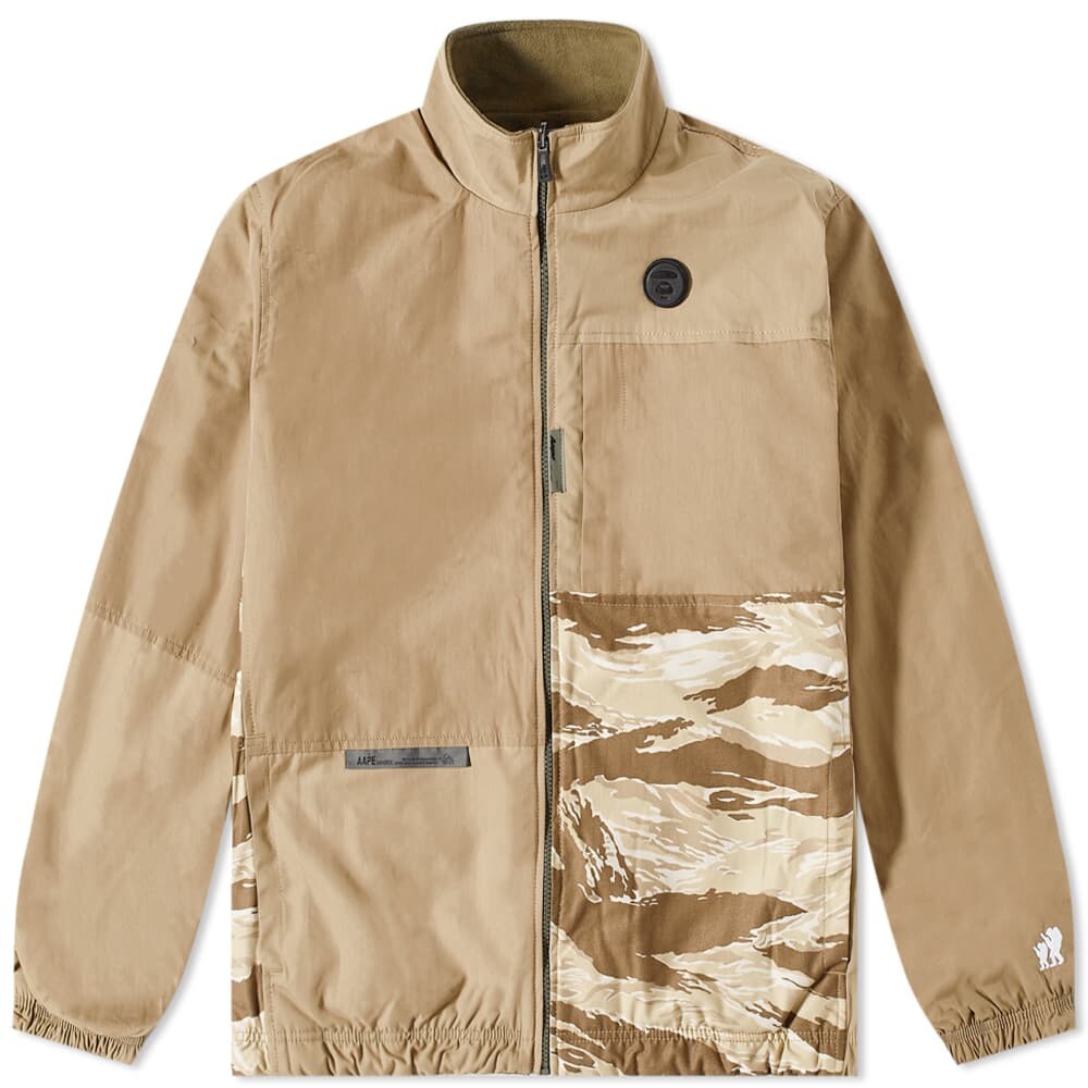 Двусторонняя флисовая куртка APE с камуфляжной вставкой AAPE by A Bathing Ape, Коричневый
Двусторонняя флисовая куртка APE с камуфляжной вставкой AAPE by A Bathing Ape, Коричневый
