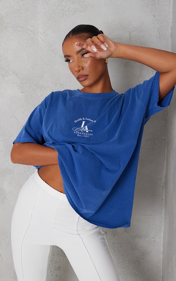 PrettyLittleThing Темно-синяя потертая футболка с принтом Health And Leisure, Синий
PrettyLittleThing Темно-синяя потертая футболка с принтом Health And Leisure, Синий