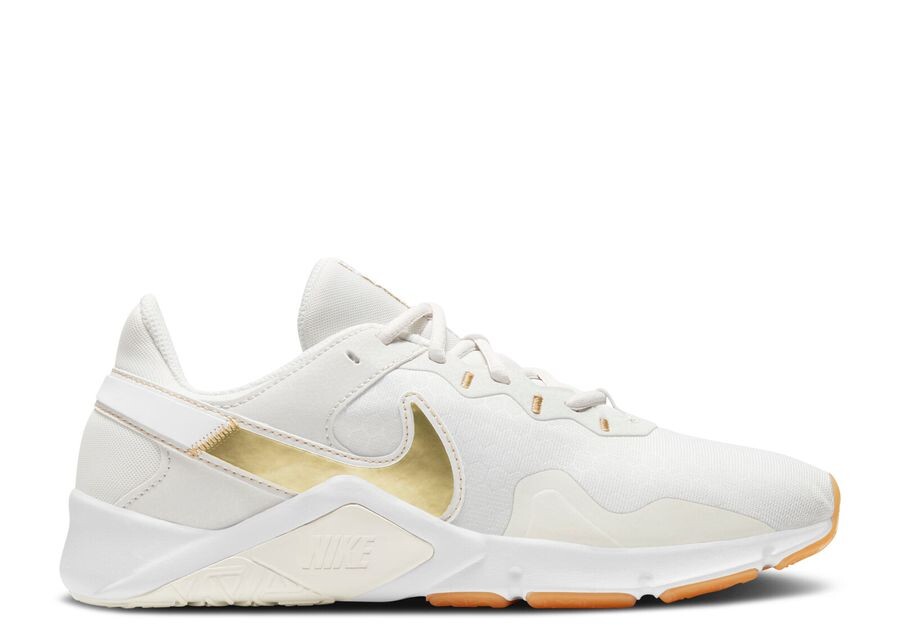 Кроссовки Nike Wmns Legend Essential 2 'Platinum Tint Metallic Gold Star', белый
Кроссовки Nike Wmns Legend Essential 2 'Platinum Tint Metallic Gold Star', белый