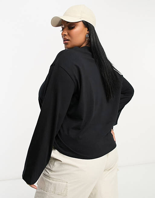 Черная футболка свободного кроя с высоким воротником и длинными рукавами ASOS DESIGN Curve
Черная футболка свободного кроя с высоким воротником и длинными рукавами ASOS DESIGN Curve