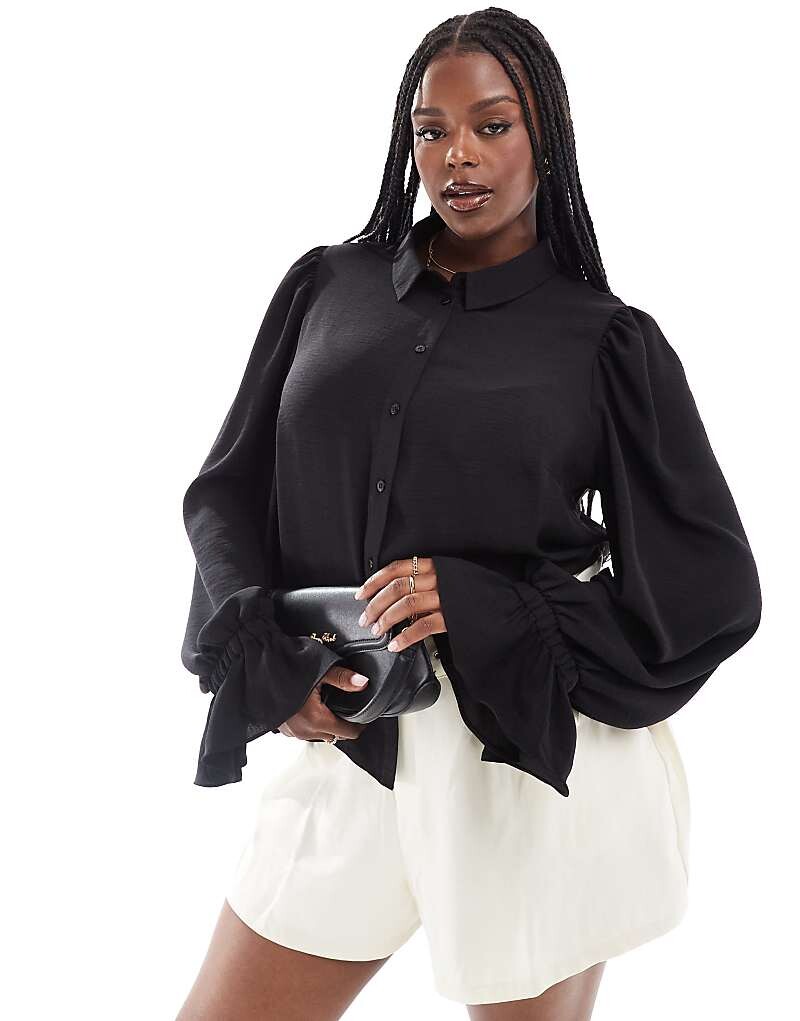 Черная мягкая рубашка с объемными рукавами и рюшами на манжетах ASOS DESIGN Curve
Черная мягкая рубашка с объемными рукавами и рюшами на манжетах ASOS DESIGN Curve