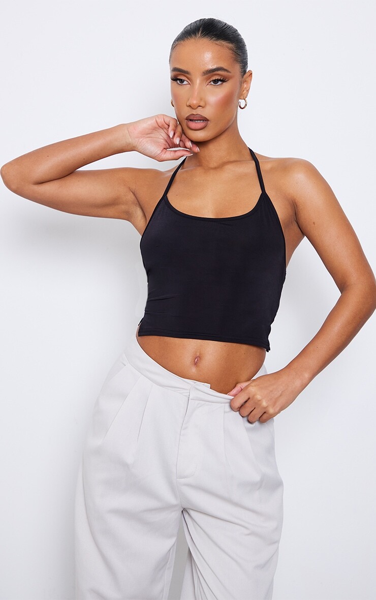 PrettyLittleThing Черный обтягивающий укороченный топ с разрезом по бокам и бретелькой на бретельках
PrettyLittleThing Черный обтягивающий укороченный топ с разрезом по бокам и бретелькой на бретельках
