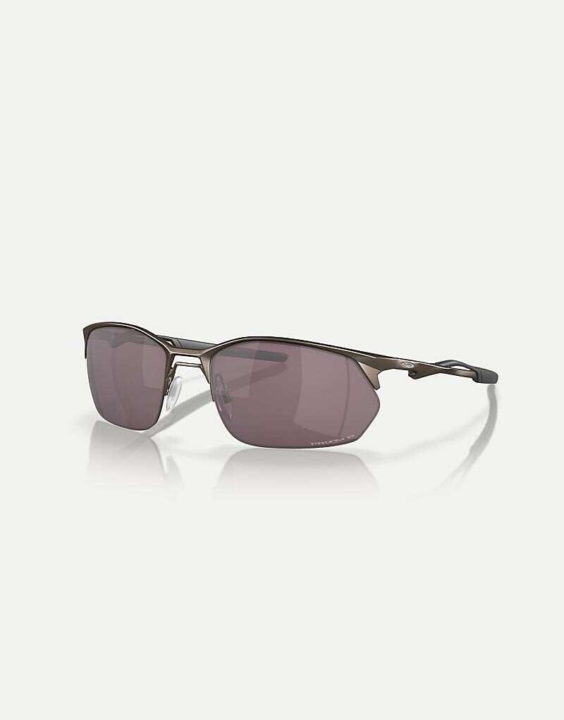 Серые солнцезащитные очки прямоугольной поляризации Oakley Wire Tap 2.0 с коричневыми зеркальными линзами
Серые солнцезащитные очки прямоугольной поляризации Oakley Wire Tap 2.0 с коричневыми зеркальными линзами