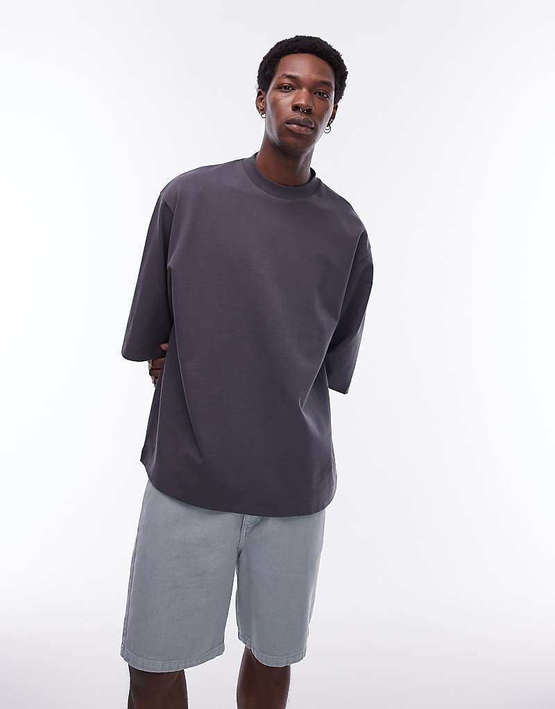 Topman — качественная повседневная футболка из плотной ткани темно-серого цвета с рукавами средней длины, 300 г/м²
Topman — качественная повседневная футболка из плотной ткани темно-серого цвета с рукавами средней длины, 300 г/м²