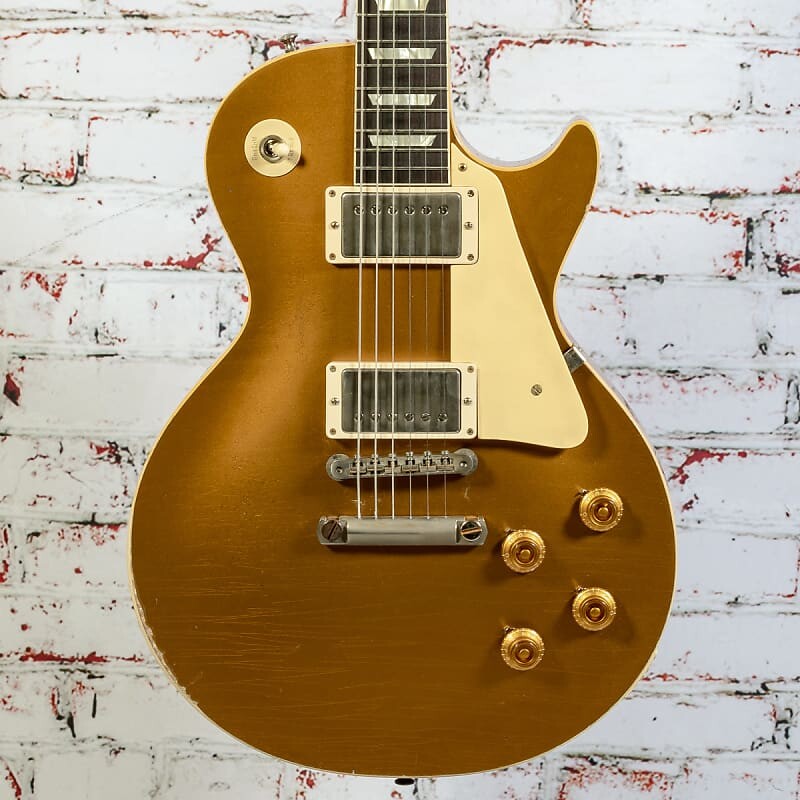 Электрогитара Gibson - 1957 Les Paul Reissue - Electric Guitar - Goldtop Ultra Heavy Aged Double Gold - w/ Aged Brown/Pink Lifton Reissue 5-Latch Case - x3857
Электрогитара Gibson - 1957 Les Paul Reissue - Electric Guitar - Goldtop Ultra Heavy Aged Double Gold - w/ Aged Brown/Pink Lifton Reissue 5-Latch Case - x3857