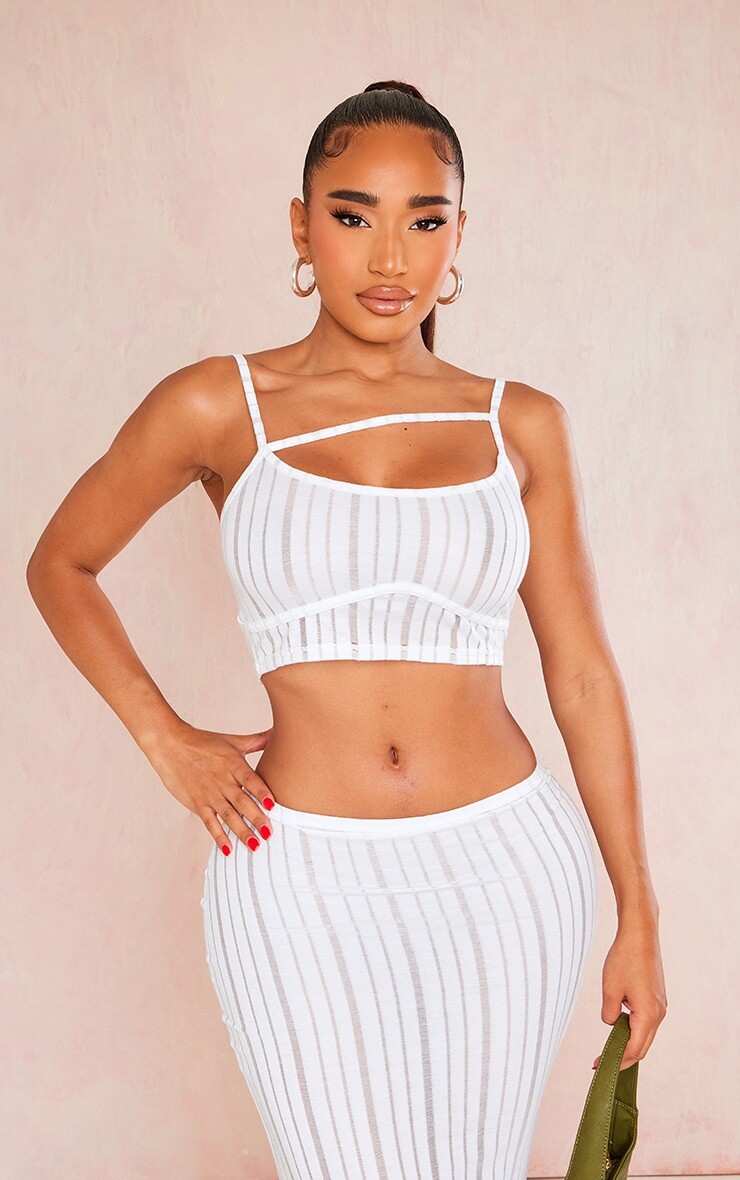 PrettyLittleThing Белый бюстгальтер без косточек с вырезами в рубчик спереди и бретелями
PrettyLittleThing Белый бюстгальтер без косточек с вырезами в рубчик спереди и бретелями