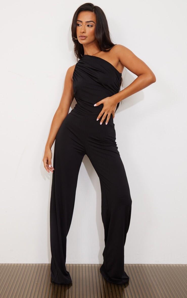 PrettyLittleThing Миниатюрный черный комбинезон с широкими штанинами и рюшами на одно плечо
PrettyLittleThing Миниатюрный черный комбинезон с широкими штанинами и рюшами на одно плечо