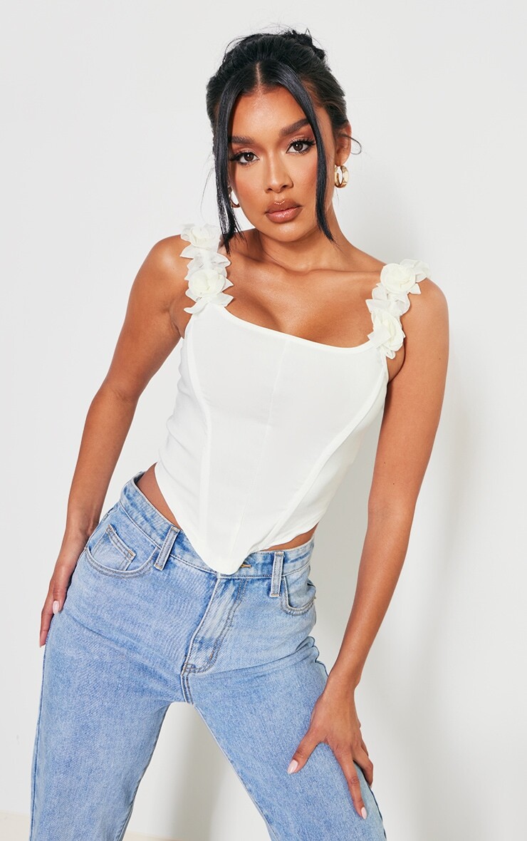 PrettyLittleThing Верх из эластичного корсета цвета слоновой кости с цветочным узором
PrettyLittleThing Верх из эластичного корсета цвета слоновой кости с цветочным узором