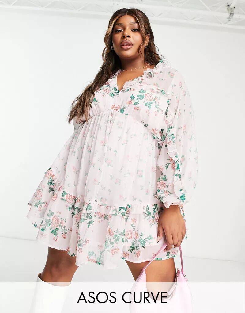 Розовое приталенное платье мини с цветочным принтом ASOS DESIGN Curve, V-образным вырезом спереди и сзади и оборками
Розовое приталенное платье мини с цветочным принтом ASOS DESIGN Curve, V-образным вырезом спереди и сзади и оборками
