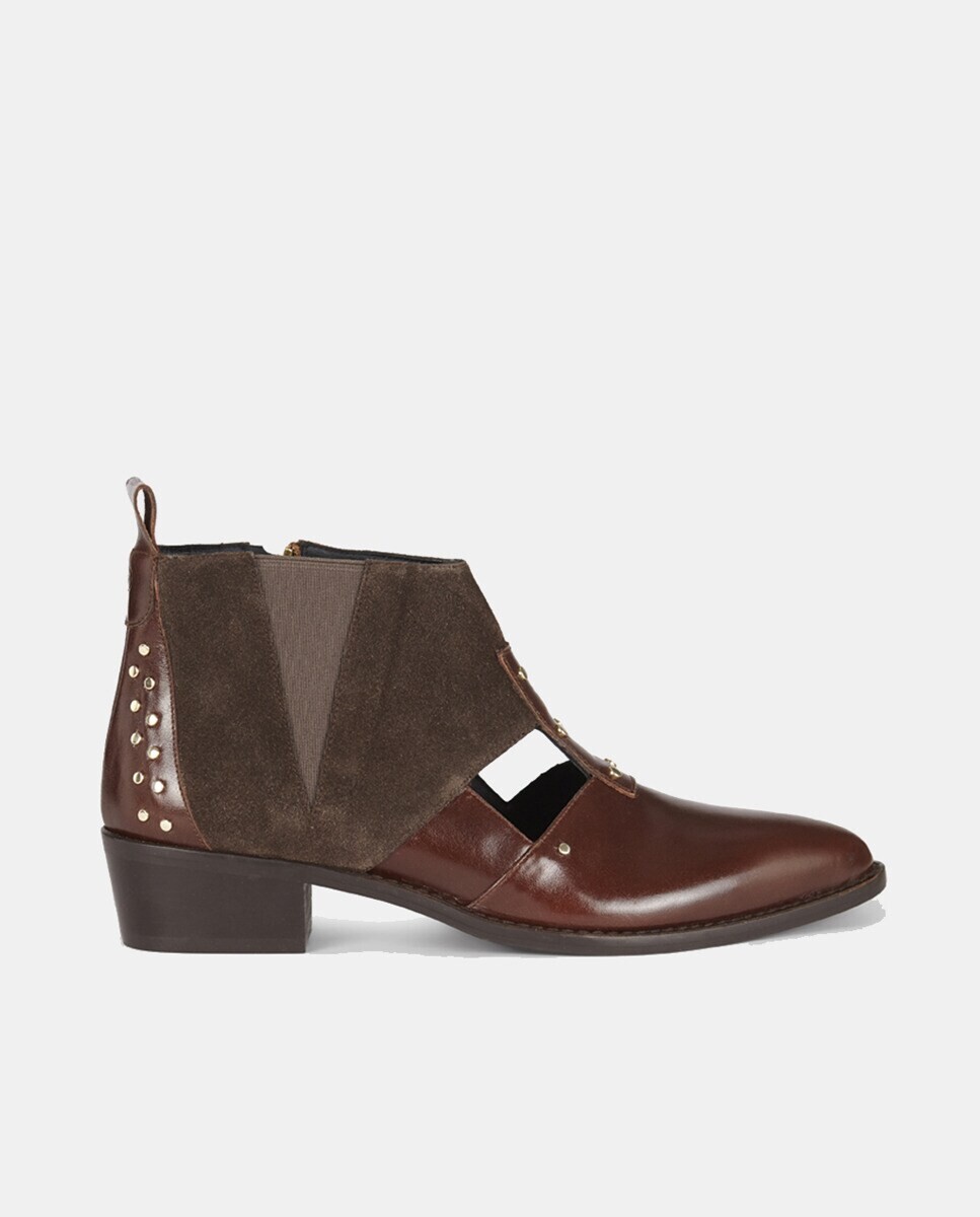 Женские ботильоны Victoria Boots с острым носком, декором из шипов и блочным каблуком Micuir, коричневый
Женские ботильоны Victoria Boots с острым носком, декором из шипов и блочным каблуком Micuir, коричневый