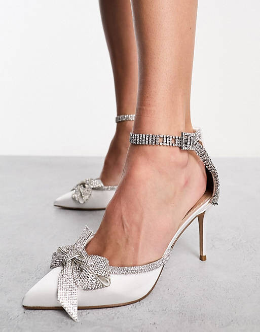 Атласные туфли на каблуке с декорированными бантиками Steve Madden Live Up цвета слоновой кости
Атласные туфли на каблуке с декорированными бантиками Steve Madden Live Up цвета слоновой кости