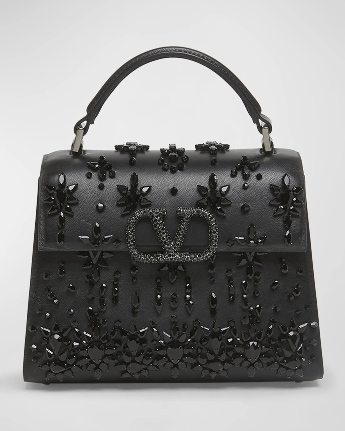 Миниатюрная сумка Vsling со стразами и верхней ручкой Valentino Garavani, цвет Jet Black Ruthenium
Миниатюрная сумка Vsling со стразами и верхней ручкой Valentino Garavani, цвет Jet Black Ruthenium