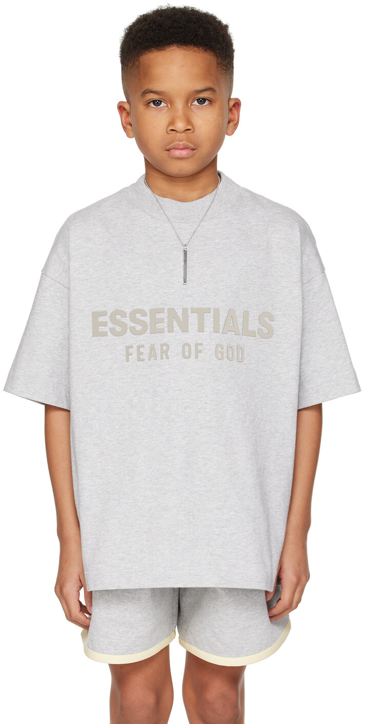 Детская серая футболка с круглым вырезом Fear Of God Essentials, цвет Light heather gray
Детская серая футболка с круглым вырезом Fear Of God Essentials, цвет Light heather gray
