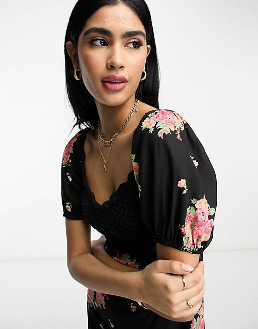 Темное платье миди с открытыми плечами ASOS DESIGN с цветочным принтом на темной основе
Темное платье миди с открытыми плечами ASOS DESIGN с цветочным принтом на темной основе