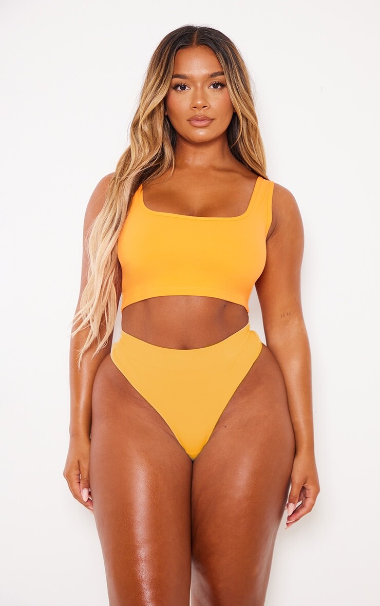 PrettyLittleThing Ярко-оранжевый мягкий бесшовный укороченный топ с круглым вырезом
PrettyLittleThing Ярко-оранжевый мягкий бесшовный укороченный топ с круглым вырезом