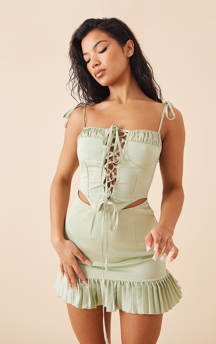 PrettyLittleThing Зеленое платье прямого кроя со шнуровкой и оборками по подолу, Зеленый
PrettyLittleThing Зеленое платье прямого кроя со шнуровкой и оборками по подолу, Зеленый
