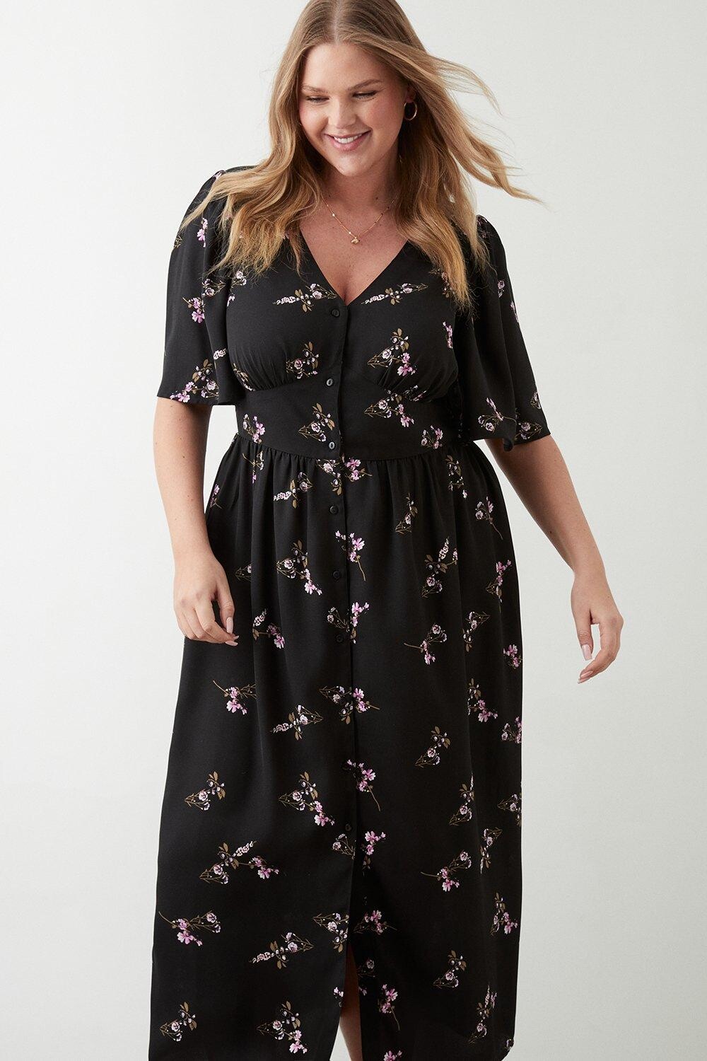 Фиолетовое платье миди Curve с цветочным принтом и пуговицами спереди Dorothy Perkins, черный
Фиолетовое платье миди Curve с цветочным принтом и пуговицами спереди Dorothy Perkins, черный