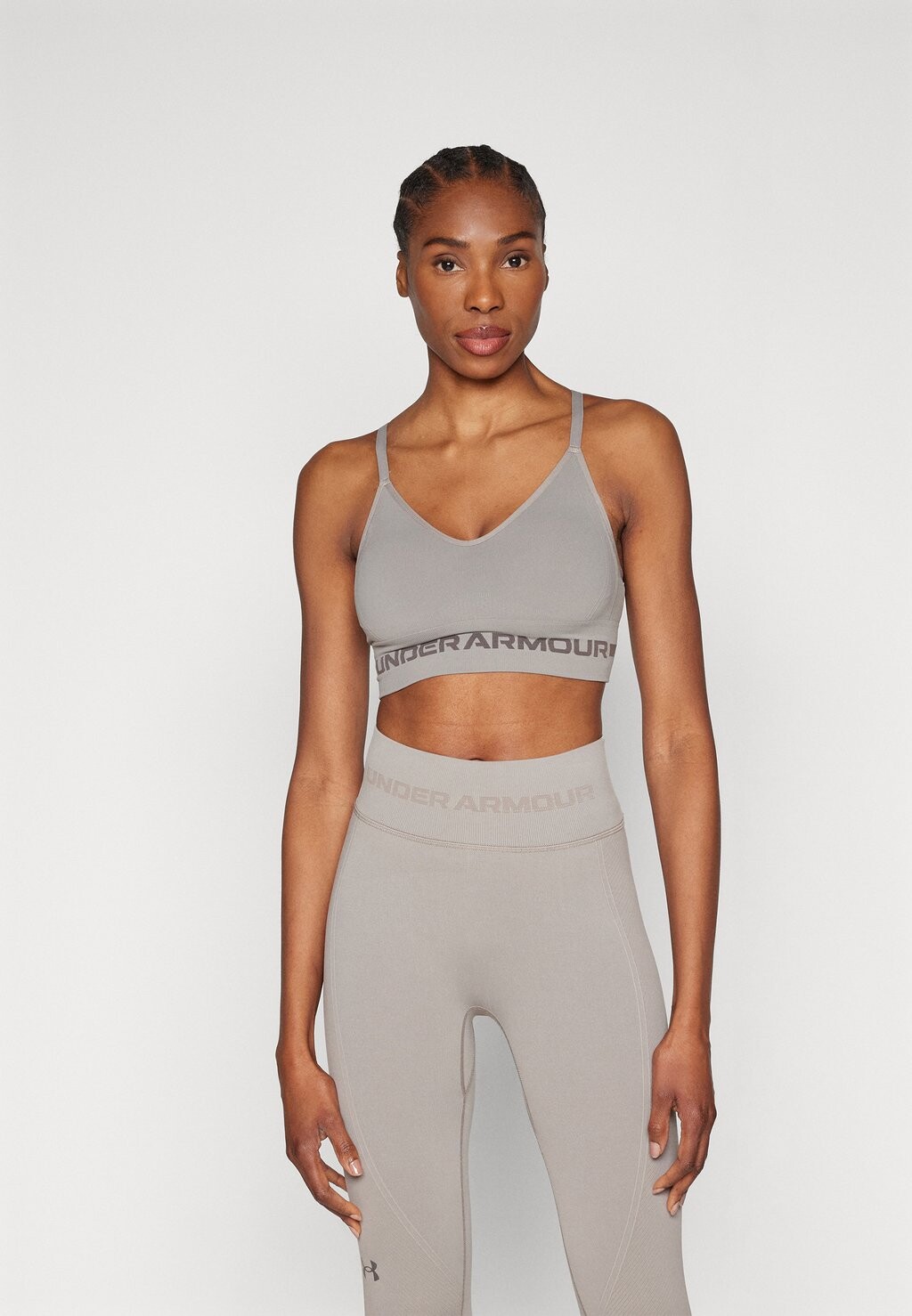 Спортивный бюстгальтер с легкой поддержкой SEAMLESS LOW LONG BRA Under Armour, цвет pewter/fresh clay
Спортивный бюстгальтер с легкой поддержкой SEAMLESS LOW LONG BRA Under Armour, цвет pewter/fresh clay