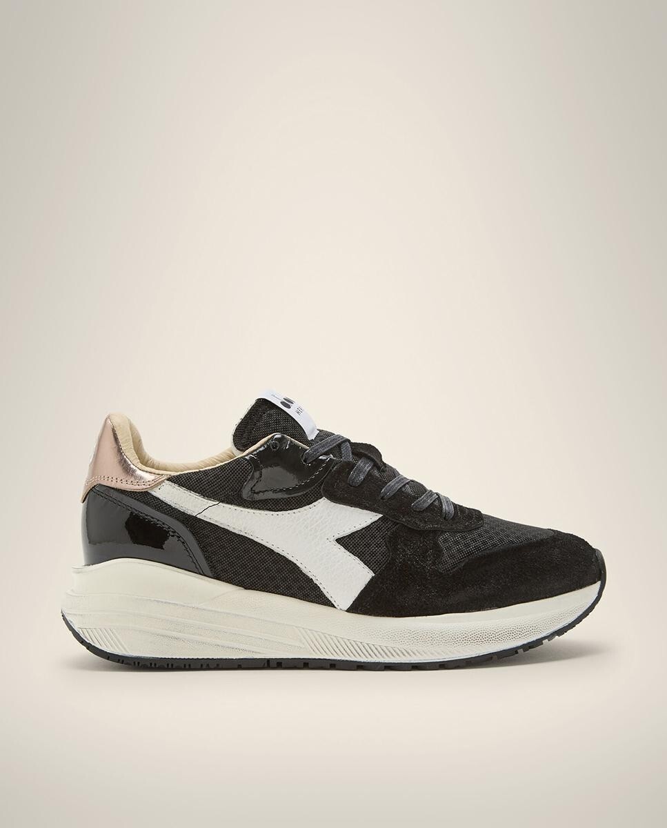 Женские черные спортивные кроссовки с фирменной нашивкой на язычке Diadora Heritage, черный
Женские черные спортивные кроссовки с фирменной нашивкой на язычке Diadora Heritage, черный